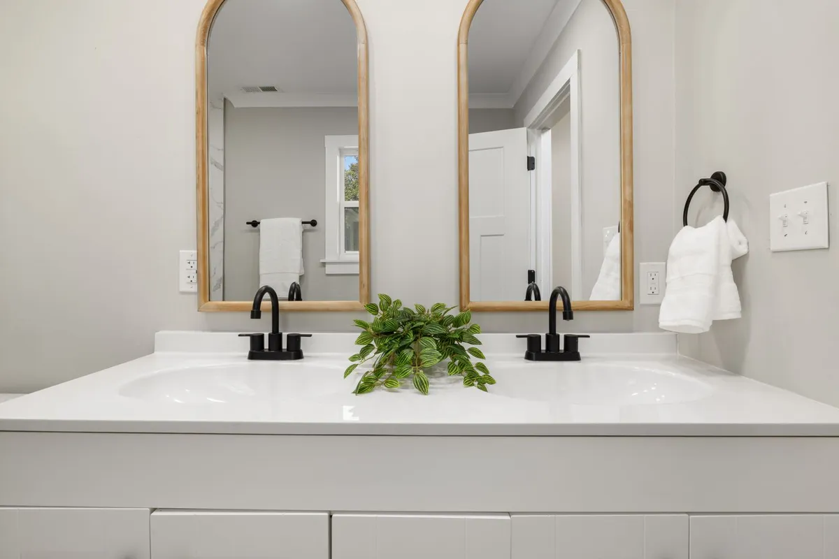 Matching the new faucet to the sink's existing holes keeps the job in the standard band — HomeGuide prices the labor at $130–$350 when the configuration does not change