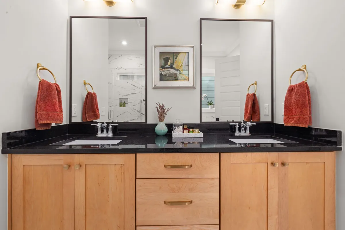 A widespread faucet mounts three separate pieces across 8-inch spacing — Angi prices the faucets at $70–$600, and the fitting and alignment time is why widespread work sits above a centerset swap