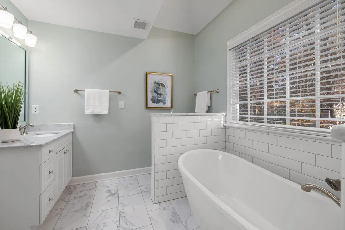 A wide window is a measuring job before it is a buying job: HomeGuide prices a 60-by-72 blind at $170–$500 installed against $40–$140 for a 24-by-36, and a blind cut to a guessed size fits neither way