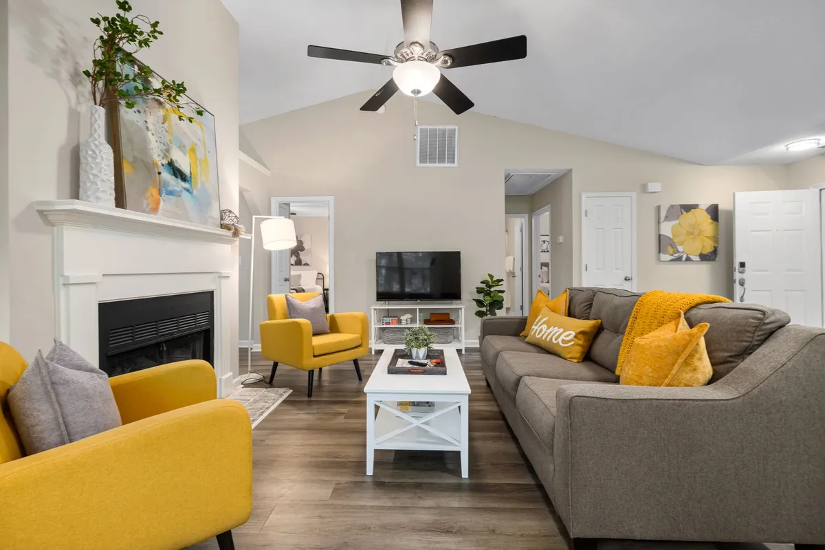 High and vaulted ceilings price above flat work: the fan needs a downrod ($10–$75 in HomeGuide) to sit 8–9 feet above the floor, and the access time joins the labor line