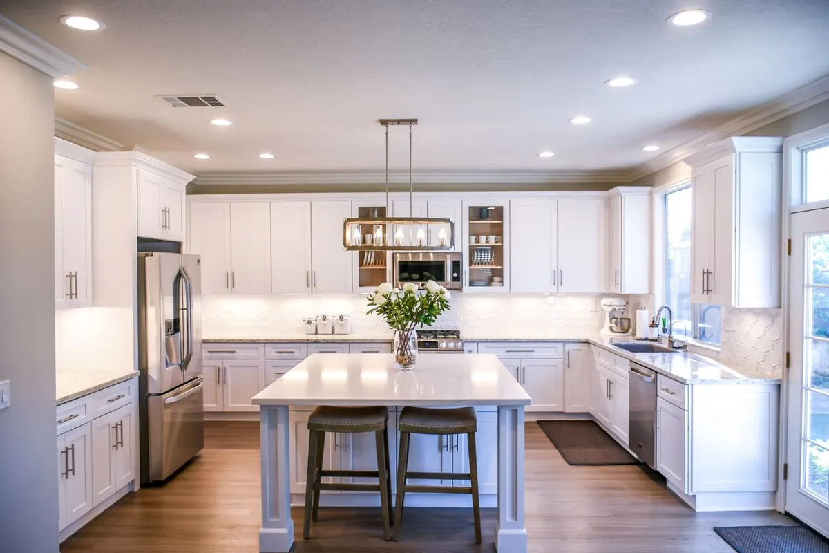 The unit is 55–65% of a typical bill — HomeGuide prices new dishwashers at $400–$1,200, so the model chosen moves the total more than the installer does
