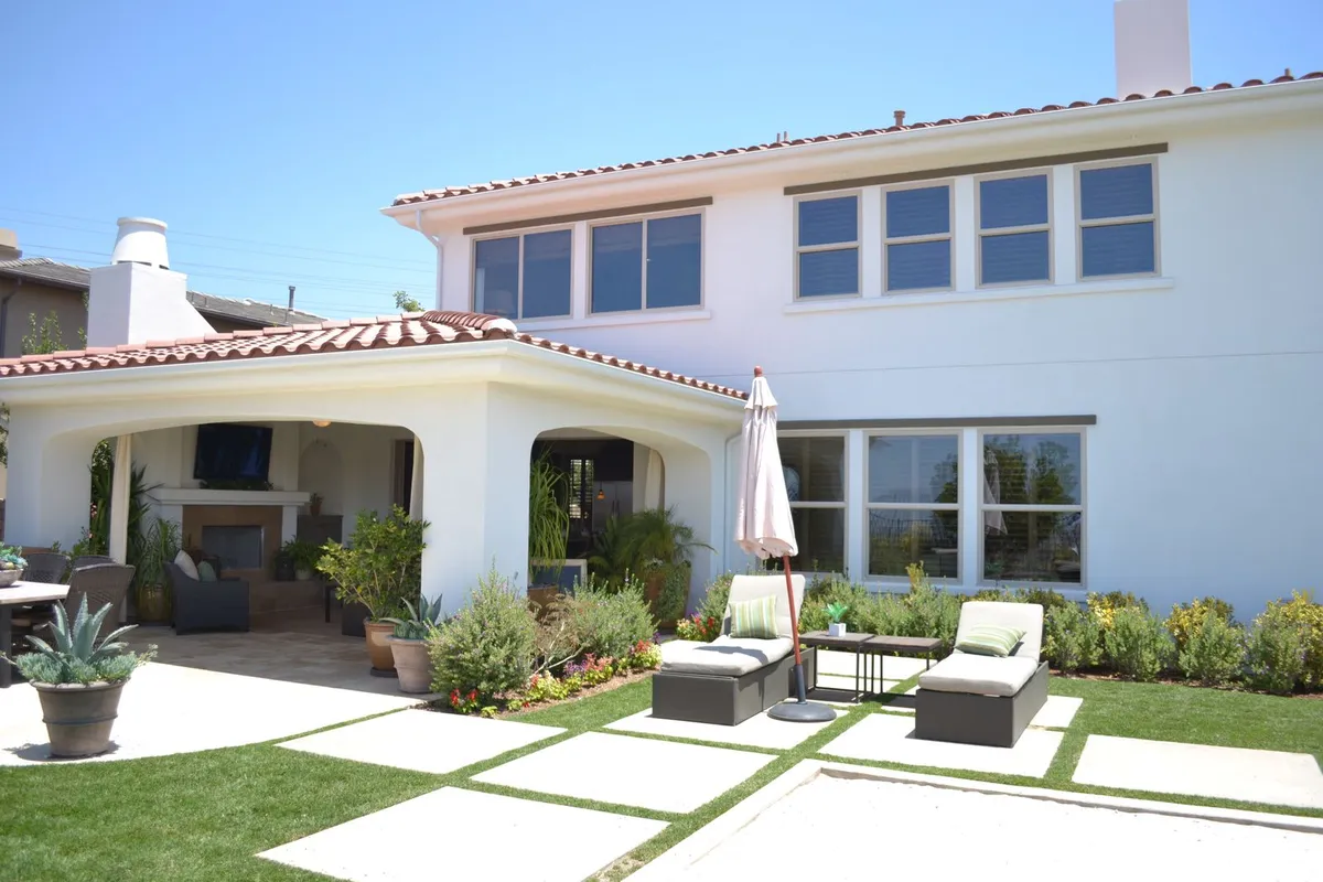 Oversized concrete pavers are the simpler end of the material range — poured concrete runs $5–$15 per sq ft installed in HomeGuide, pavers $10–$17