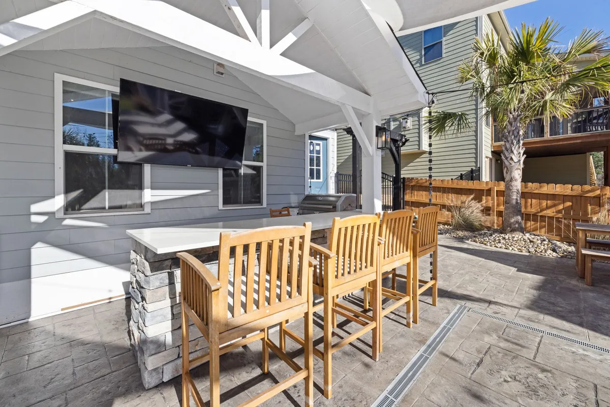A covered section prices above open paving because the roof structure is extra — the ground work under it, base, paving and drainage, is the same job priced on this page