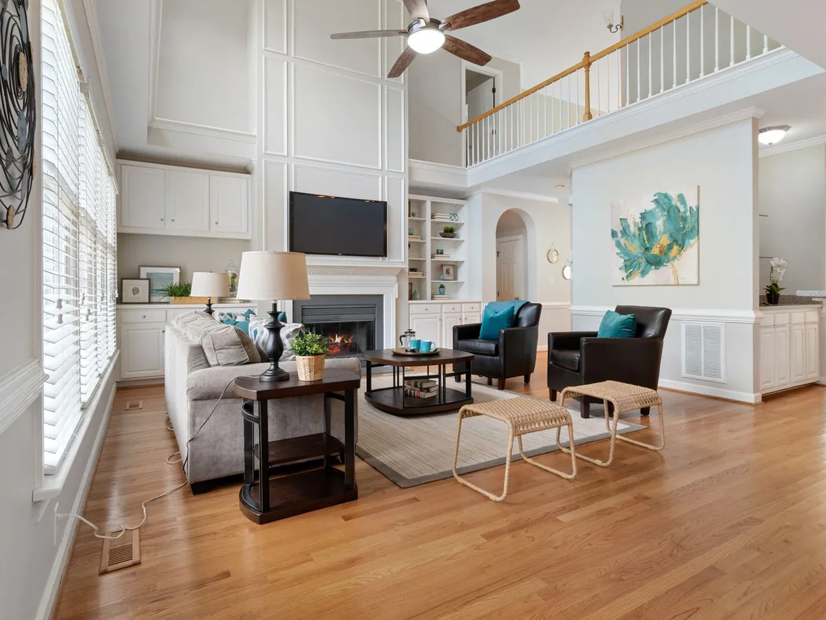 Living room with a smooth finished ceiling after popcorn removal