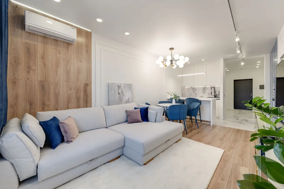 Living areas are the standard 6-light job on this page at $700–$1,650 in an existing ceiling — spacing of 4–6 feet is what keeps the light even