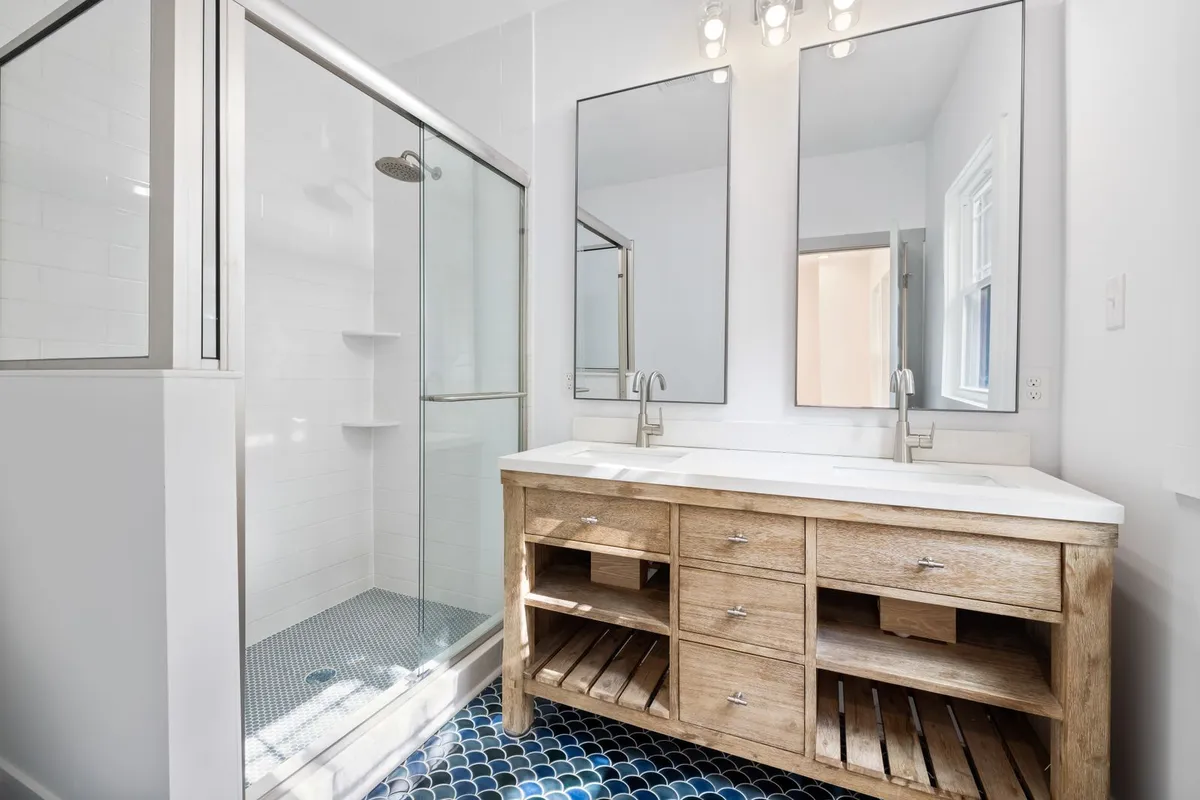 A sliding framed door is the common alcove upgrade — Angi prices sliding and bypass doors at $700–$2,000 installed