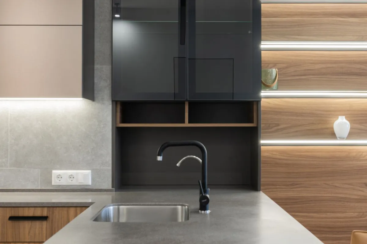 A kitchen counter with its sink cut out, seen from above the run — soapstone is softer and easier to cut than granite or quartz, which is why its cutouts can price below harder stones' in the guides.