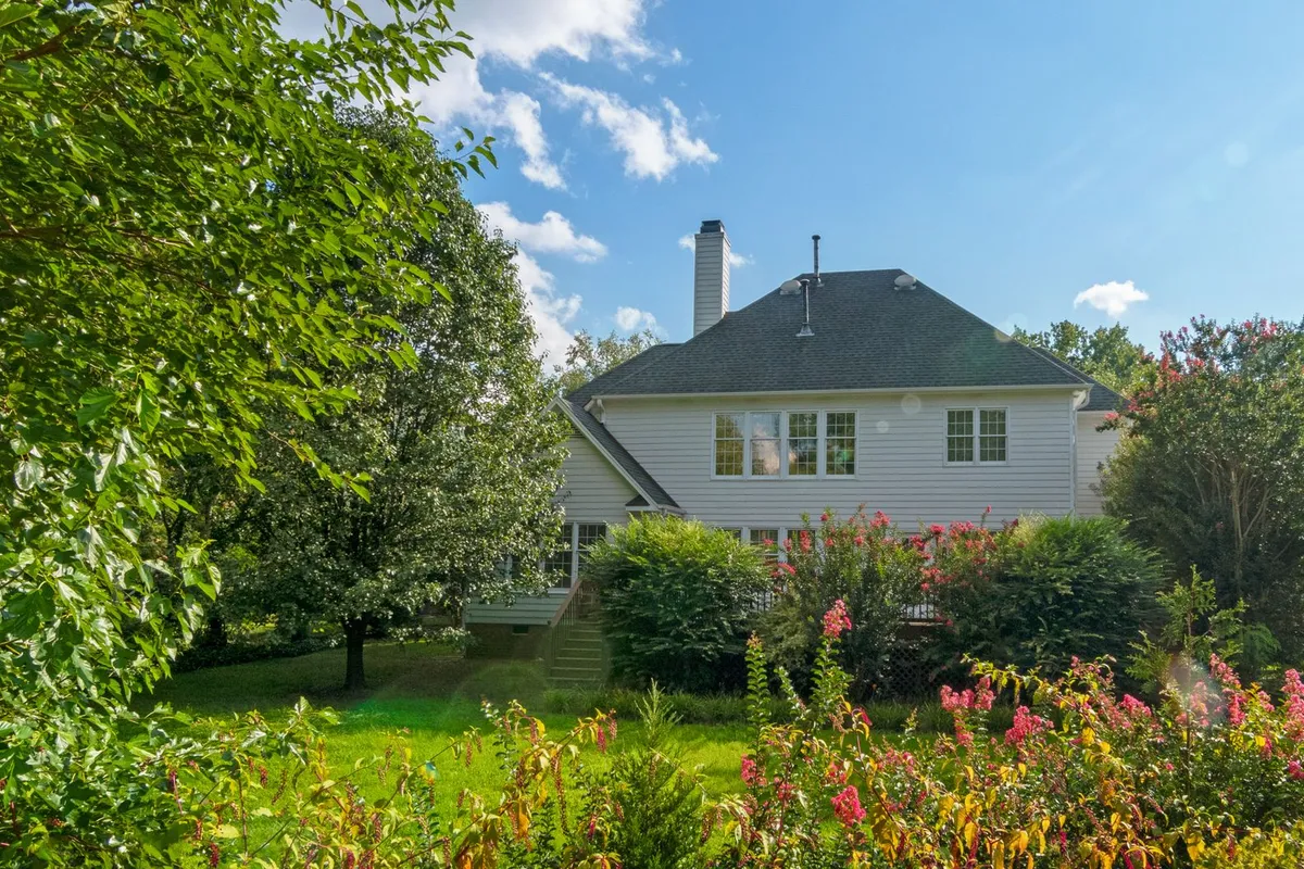 Beds and lawn drink differently, so they zone separately — HomeGuide prices drip zones for beds at $300–$1,200 against $600–$2,000 for a lawn sprinkler zone