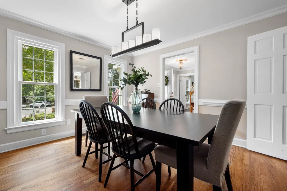 Height is a budget line, not just a look: at the standard one-third-of-the-wall height in HomeGuide, this room carries roughly 100 square feet of panel — every extra foot of height adds a foot of panel per linear foot of wall