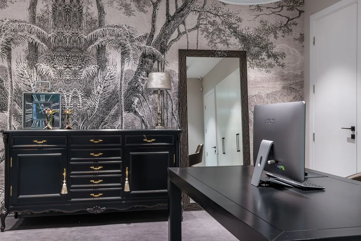 Seams and pattern alignment decide whether a papered wall reads as one picture — the reason hanging labor, at 45–55%, is the largest line in the breakdown