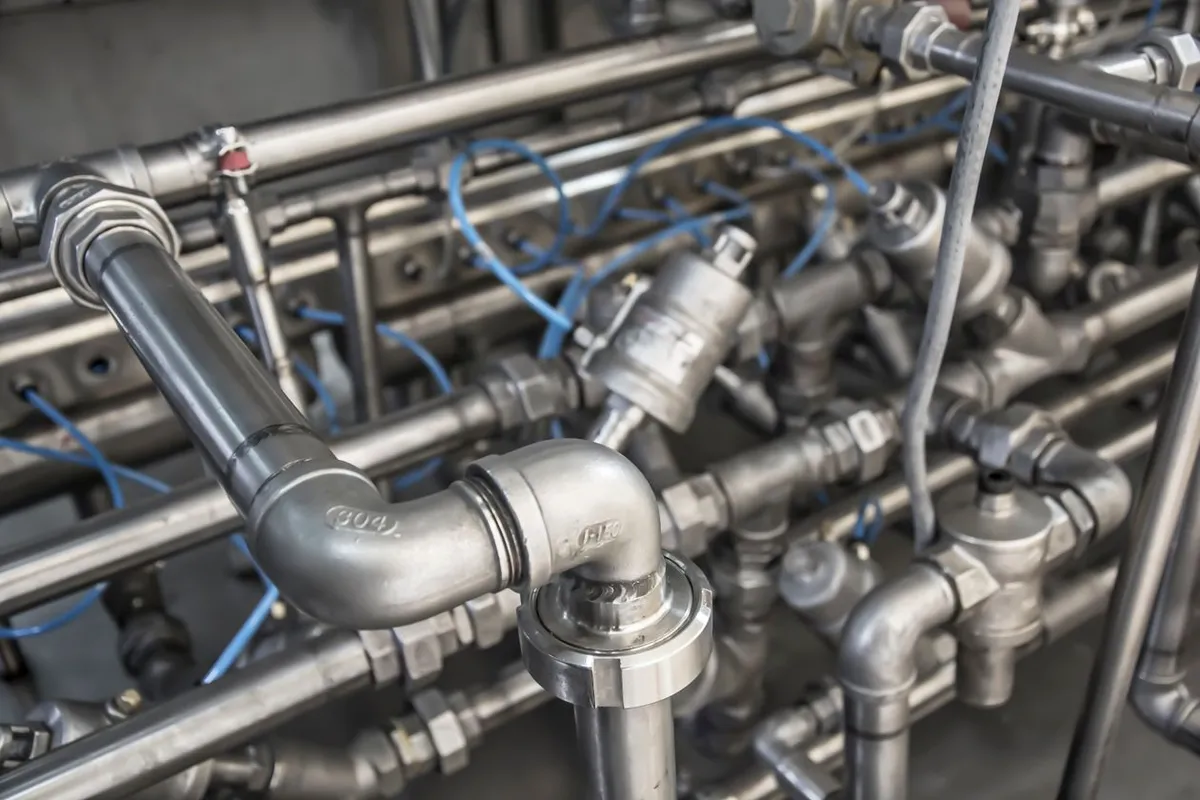 The install quality lives in the pipework — bypass valve, unions and a drain that can take the regeneration flow: HomeGuide prices whole-house installation labor at $200–$600 on top of the unit